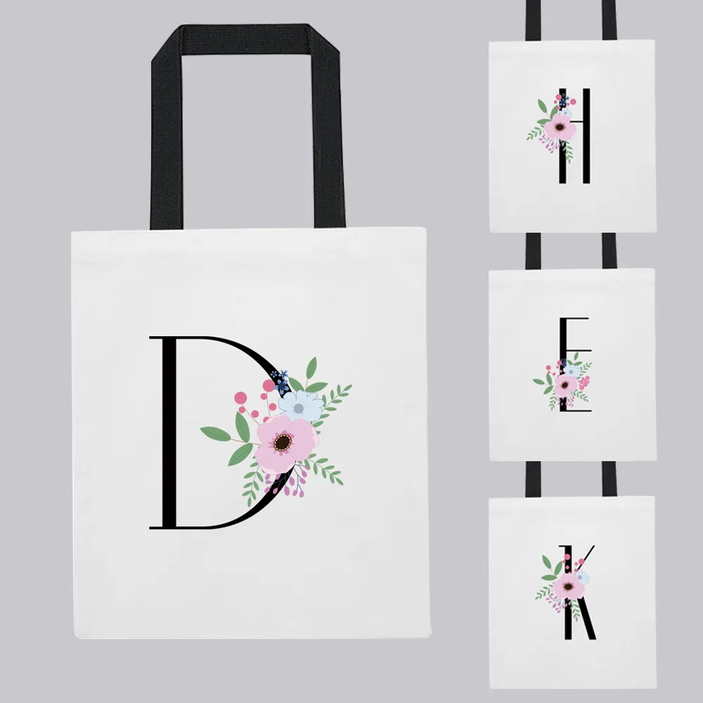 Women‘s Shopper Shoulder Bag Reusable Shopping Bag Women Canvas Tote Bags Printing Eco Bag Flower and Black Letter Name Pattern
Women‘s Shopper Shoulder Bag Reusable Shopping Bag Women Canvas Tote Bags Printing Eco Bag Flower and Black Letter Name Pattern