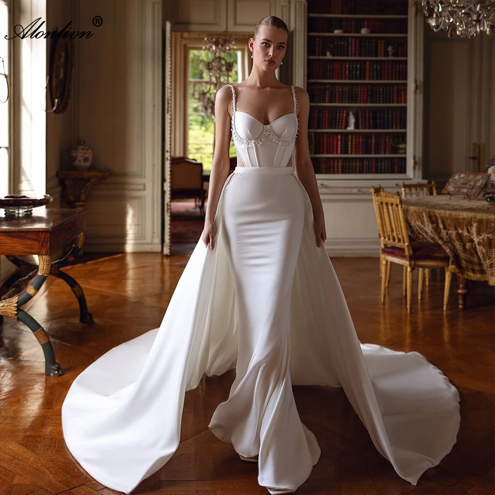 Alonlivn Customize Made Elegant Beaded Pearls 2 In 1 Wedding Gowns Mermaid Removable Train Spaghetti Strap Sweetheart Bride Gown
Alonlivn Customize Made Elegant Beaded Pearls 2 In 1 Wedding Gowns Mermaid Removable Train Spaghetti Strap Sweetheart Bride Gown