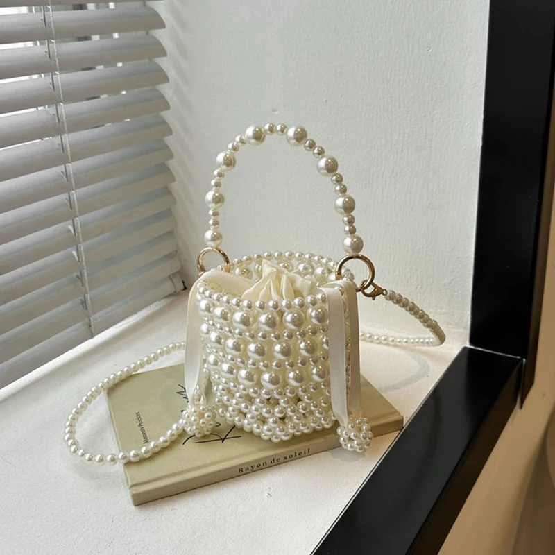 Pearl Mini Handbag 2025 New Single Shoulder Crossbody Bag Handmade Bead Weaving Lipstick Bag Elegant Drawstring Bucket Bag
Pearl Mini Handbag 2025 New Single Shoulder Crossbody Bag Handmade Bead Weaving Lipstick Bag Elegant Drawstring Bucket Bag