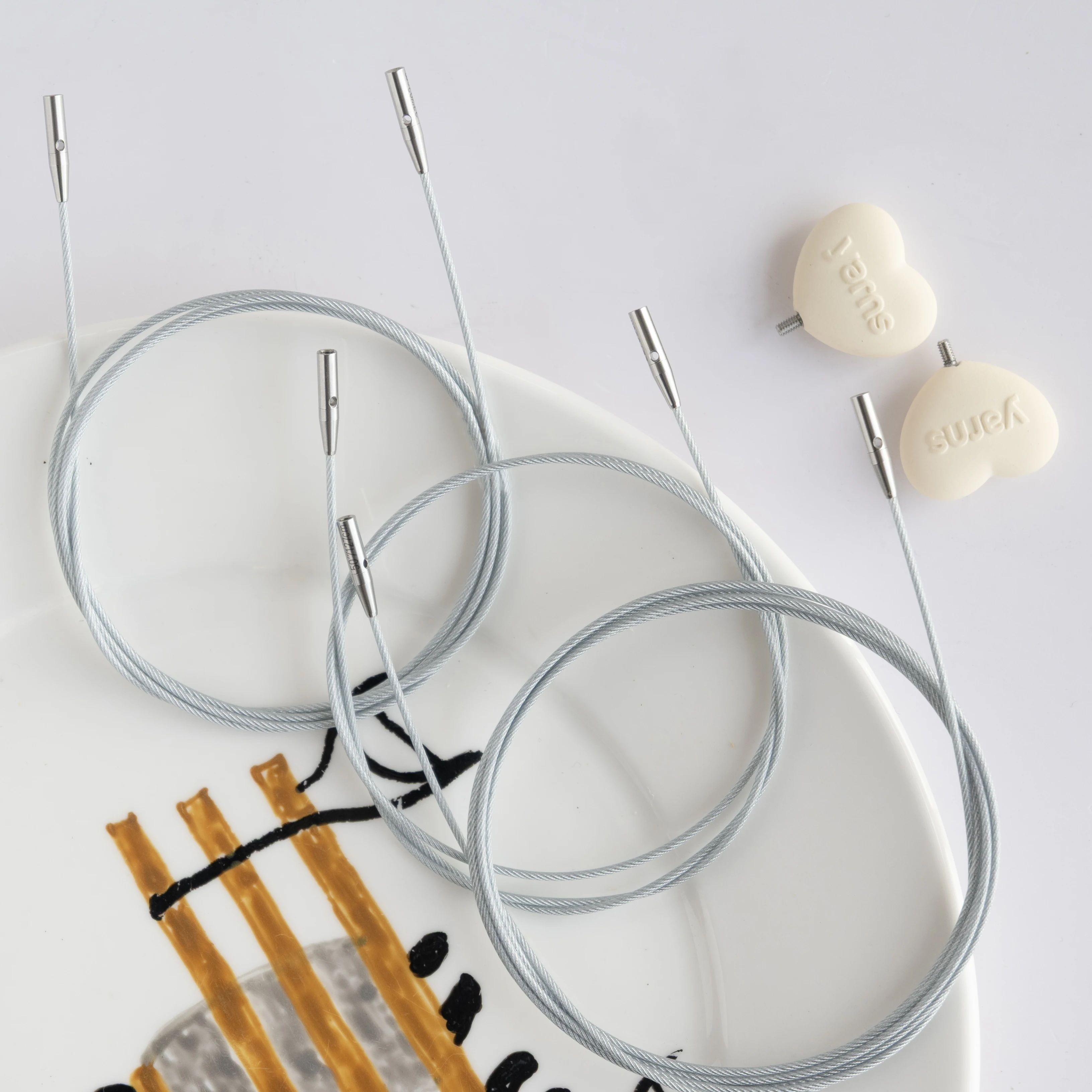 Lotus Yarns 360° Silver Swivel Cables For Interchangeable Tips with End Caps
Lotus Yarns 360° Silver Swivel Cables For Interchangeable Tips with End Caps