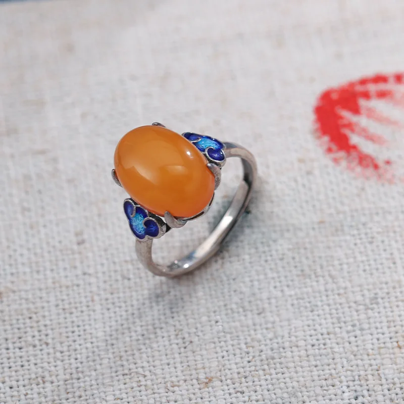 A Vintage Silver Enamel Egg-faced Amber Index Finger Ring With A Burnt Blue Color 925 Sterling Silver Ring Set Orange Beeswax 
A Vintage Silver Enamel Egg-faced Amber Index Finger Ring With A Burnt Blue Color 925 Sterling Silver Ring Set Orange Beeswax