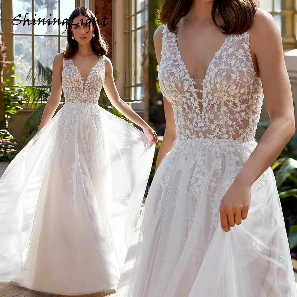 ShiningLight Bohemian Beach Wedding Dress 2026 Backless V Neck Elegant Tulle Bridal Dress vestido de novia boda civil Customized
ShiningLight Bohemian Beach Wedding Dress 2026 Backless V Neck Elegant Tulle Bridal Dress vestido de novia boda civil Customized