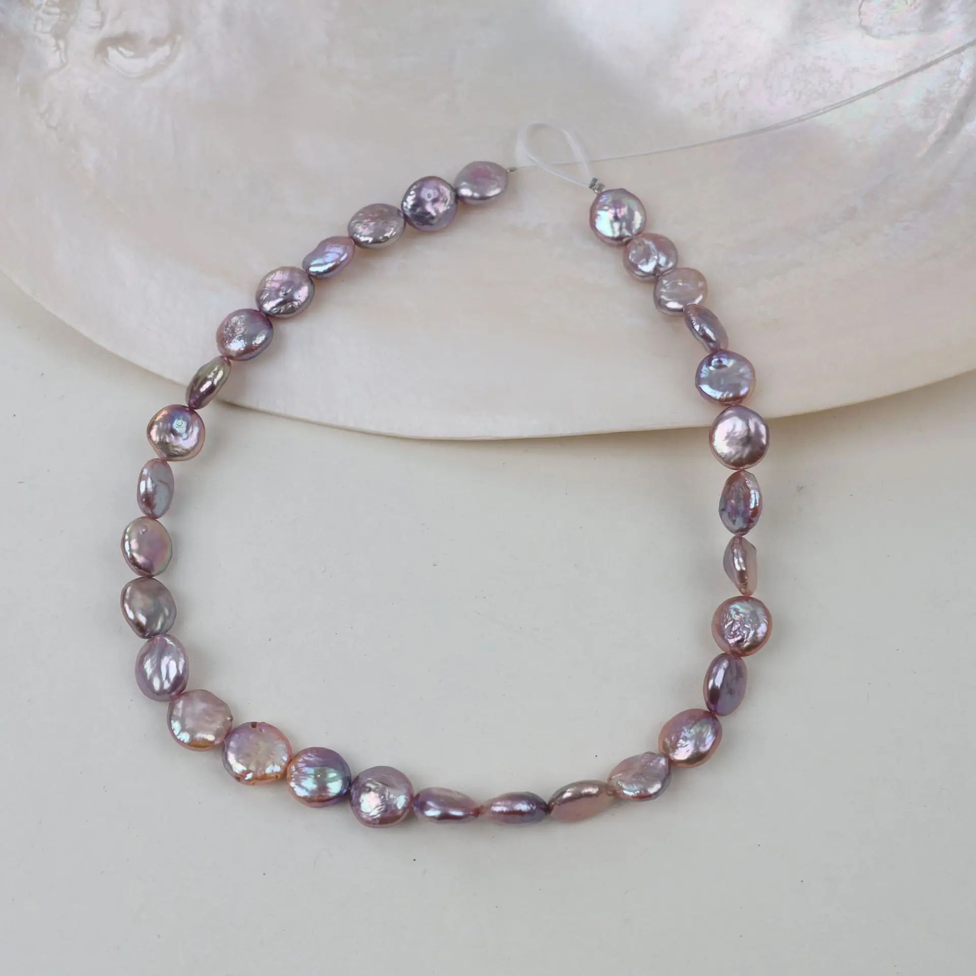 12-13mm A strand 38cm Purple Button Freshwater Pearl Loose Beads DIY Necklace Semi Finished Jewelry Craft Handmade Accessory
12-13mm A strand 38cm Purple Button Freshwater Pearl Loose Beads DIY Necklace Semi Finished Jewelry Craft Handmade Accessory