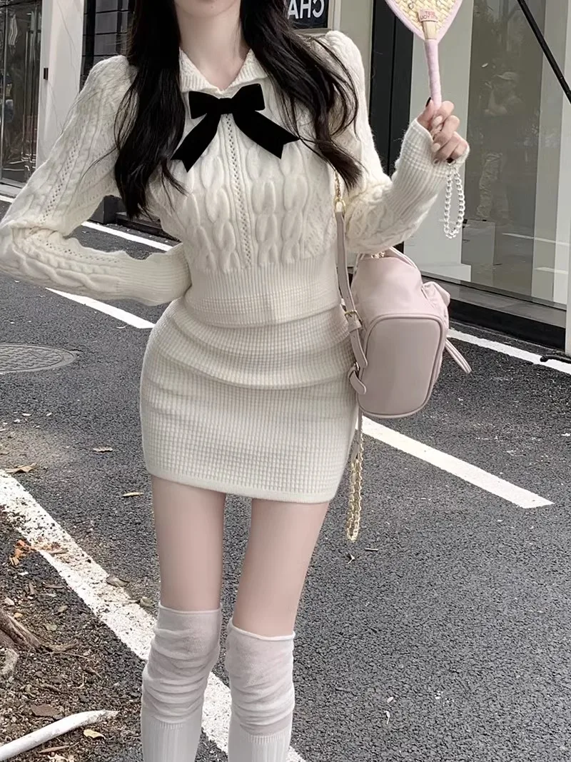 College Suit Women's Autumn Bowknot Doll Collar Long-sleeved Short Pullover Sweater High Waist Wrapped Hip Skirt Two-piece Set
College Suit Women's Autumn Bowknot Doll Collar Long-sleeved Short Pullover Sweater High Waist Wrapped Hip Skirt Two-piece Set
