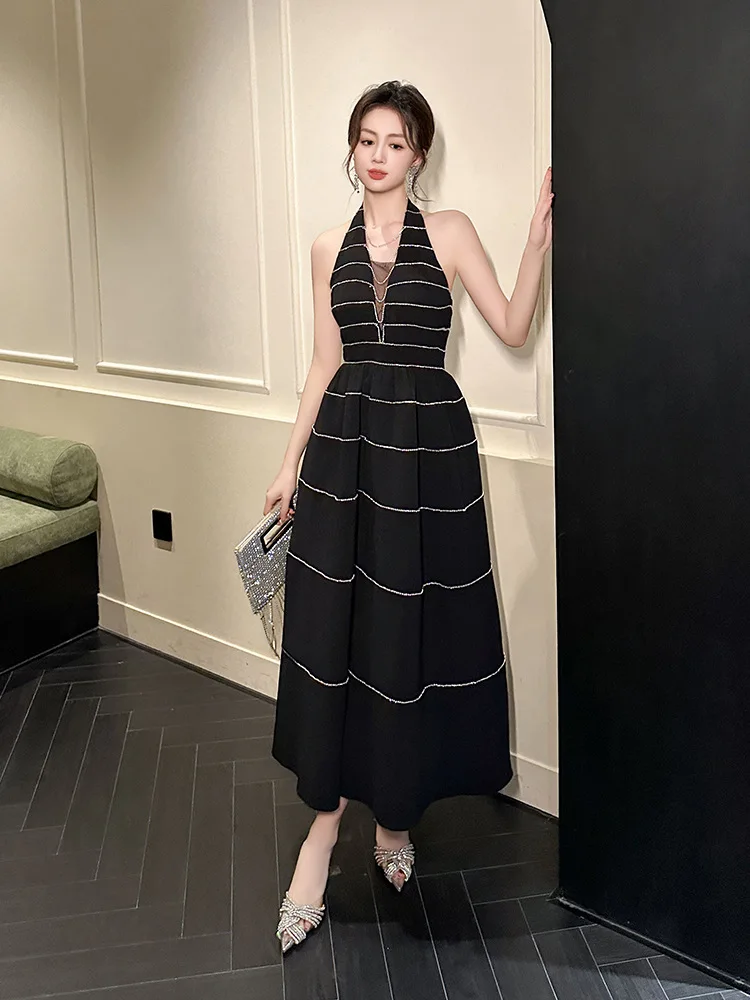 Puffy Long Skirt Summer New Women's French Design Halter Neck Waist Sleeveless Dress
Puffy Long Skirt Summer New Women's French Design Halter Neck Waist Sleeveless Dress