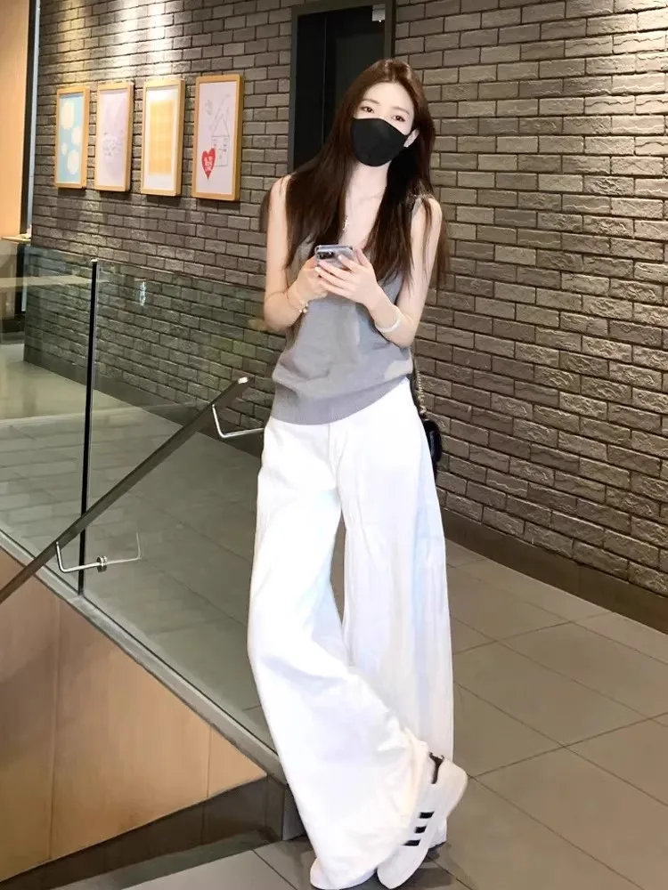 Summer Women's Sexy Elegance Korean Style Camisole Top High Waist Wide Leg Pants Two Piece Set Casual Sportswear Ensemble
Summer Women's Sexy Elegance Korean Style Camisole Top High Waist Wide Leg Pants Two Piece Set Casual Sportswear Ensemble