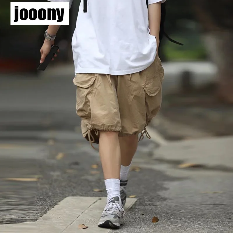 Летние ретро-шорты карго с широкими штанинами до колена на шнурке 2024, мужские уличные шорты в стиле Харадзюку с широкими штанинами, карманами и свободным кроем
Летние ретро-шорты карго с широкими штанинами до колена на шнурке 2024, мужские уличные шорты в стиле Харадзюку с широкими штанинами, карманами и свободным кроем