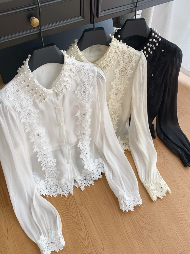 Heavy industry Summer New Pearl Patchwork lapel Neck Button Lace Embroidery Solid Long Sleeved White Shirts
Heavy industry Summer New Pearl Patchwork lapel Neck Button Lace Embroidery Solid Long Sleeved White Shirts
