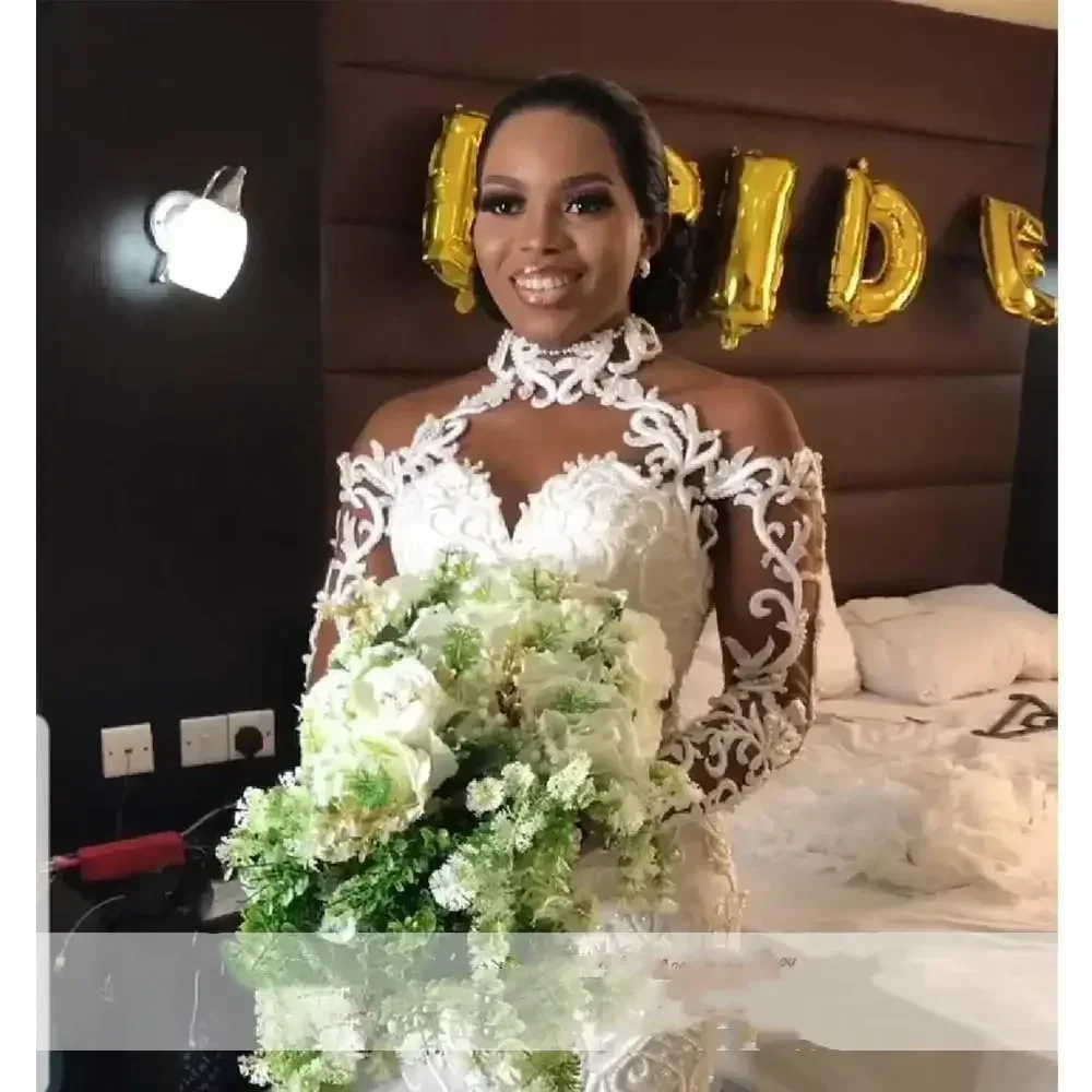 Customized Pretty African Lace Mermaid Wedding Dresses Beaded Pearls Long Bridal Gown High Neck Illusion Sleeves Retro Vestido D
Customized Pretty African Lace Mermaid Wedding Dresses Beaded Pearls Long Bridal Gown High Neck Illusion Sleeves Retro Vestido D