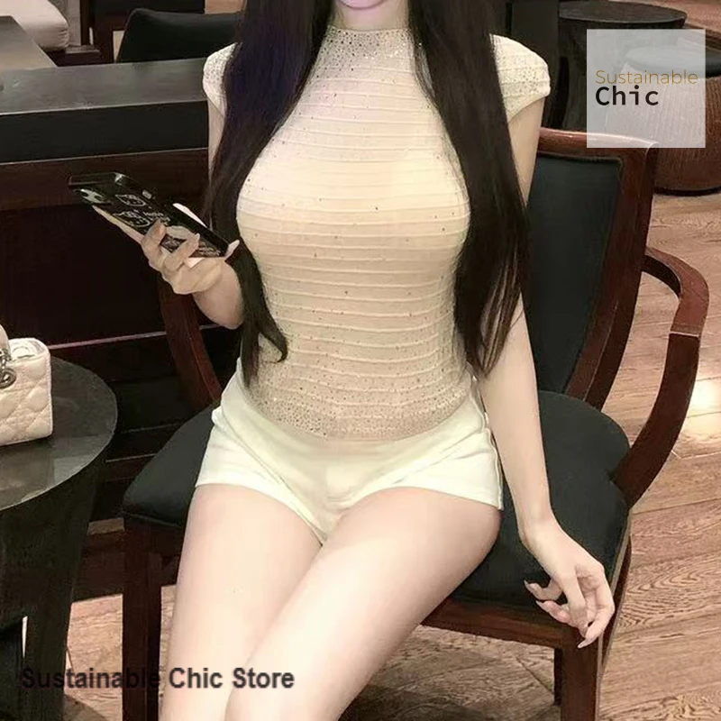 Korean solid color diamond-encrusted knitted sleeveless top women's spring and summer fashion trend advanced slim knit vest
Korean solid color diamond-encrusted knitted sleeveless top women's spring and summer fashion trend advanced slim knit vest