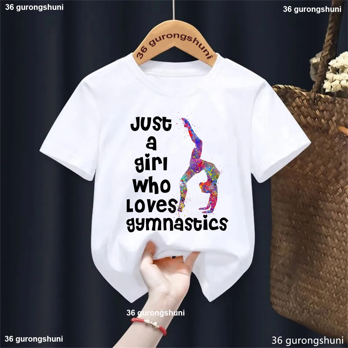 Colourful Just A Girl Who Loves Gymnastics Graphic Printed Tshirt Girls Love Sports Casual Kawaii Kids Clothes Summer T-Shirt
Colourful Just A Girl Who Loves Gymnastics Graphic Printed Tshirt Girls Love Sports Casual Kawaii Kids Clothes Summer T-Shirt