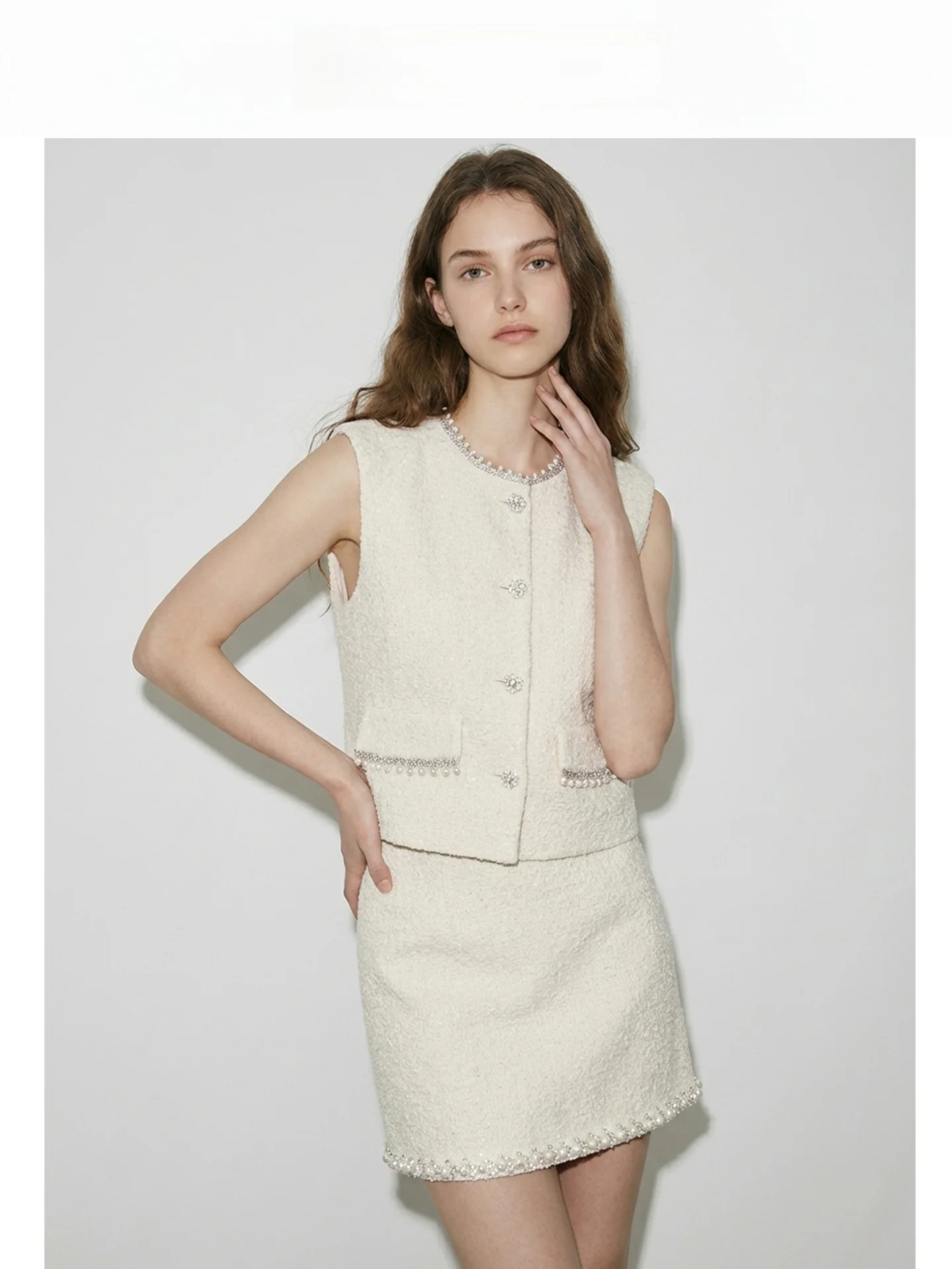 2026 New Pearl And Rhinestone Decorated Tweed Vest And Skirt Set Women's Fashion Ensemble Short Sleeve round Neck French Style
2026 New Pearl And Rhinestone Decorated Tweed Vest And Skirt Set Women's Fashion Ensemble Short Sleeve round Neck French Style