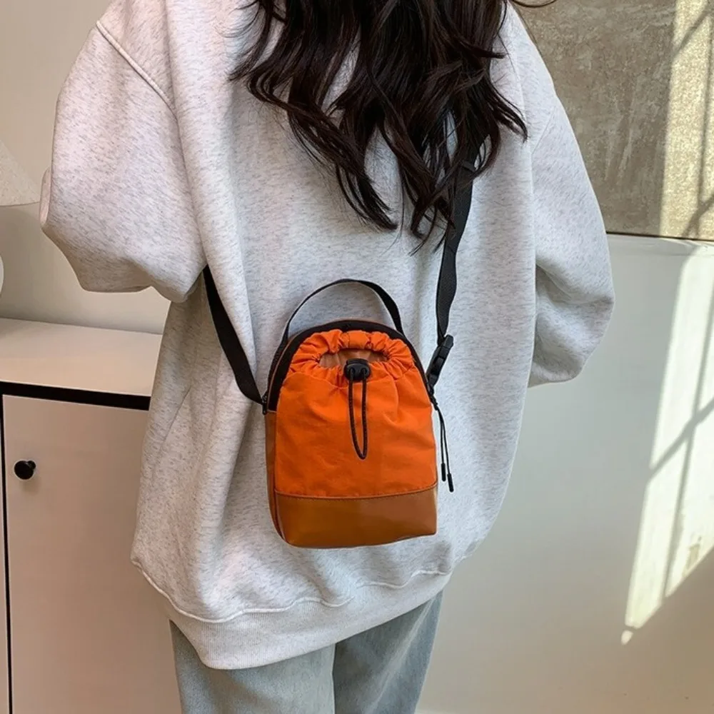 Drawstring Nylon Shoulder Bag Lightweight PU Phone Bag Adjustable Strap Coin Purse Casual Crossbody Bag Mountain Climbing
Drawstring Nylon Shoulder Bag Lightweight PU Phone Bag Adjustable Strap Coin Purse Casual Crossbody Bag Mountain Climbing