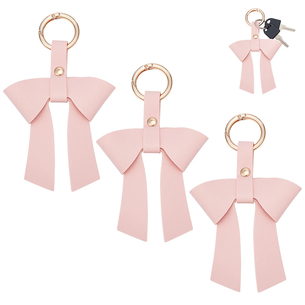 PU Leather Keychains Bowknot with Alloy Clasps Golden Pink 150mm
PU Leather Keychains Bowknot with Alloy Clasps Golden Pink 150mm