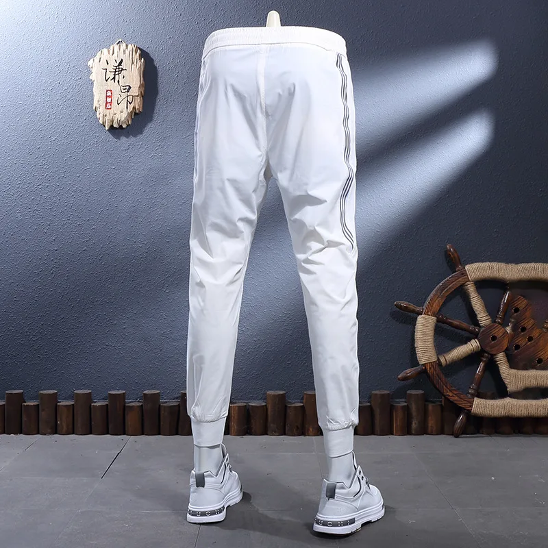 Summer thin breathable fashionable trend light luxury striped printed casual pants men's elastic slim fit sports pants
Summer thin breathable fashionable trend light luxury striped printed casual pants men's elastic slim fit sports pants