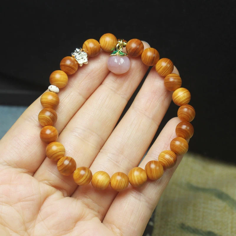 High-oil cypress wood 8mm bracelet with pink peach pendant, forest-style women's Buddhist prayer beads jewelry
High-oil cypress wood 8mm bracelet with pink peach pendant, forest-style women's Buddhist prayer beads jewelry