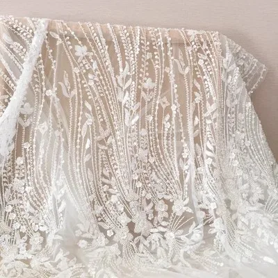 Off White with Silvery Beading Tulle Mesh Lace Fabric Wedding Lace Material Luxury Beaded Embroidery Gauze Lace
Off White with Silvery Beading Tulle Mesh Lace Fabric Wedding Lace Material Luxury Beaded Embroidery Gauze Lace