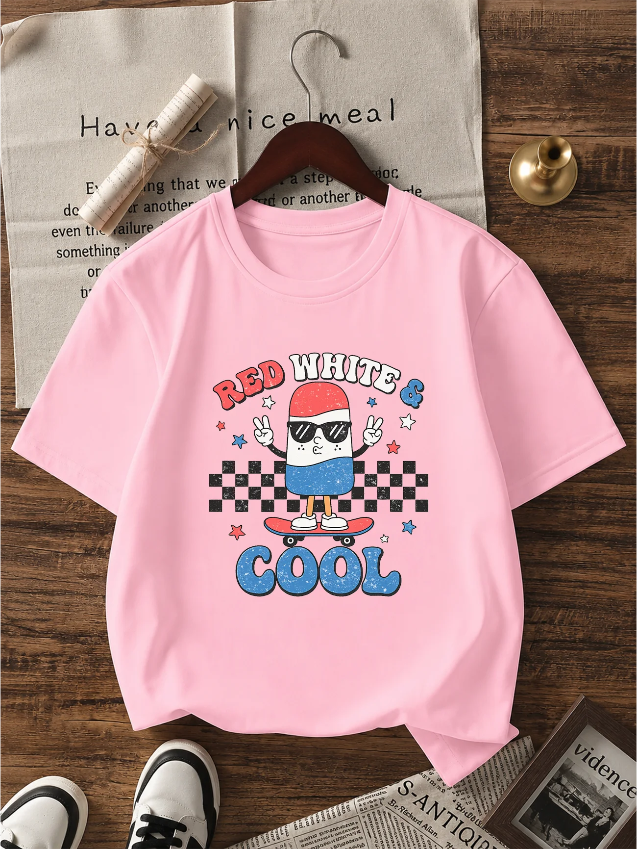 Women's "Red White & Cool" Retro Popsicle Skateboard Graphic Print T-Shirt, Patriotic Checkerboard Design.
Women's "Red White & Cool" Retro Popsicle Skateboard Graphic Print T-Shirt, Patriotic Checkerboard Design.