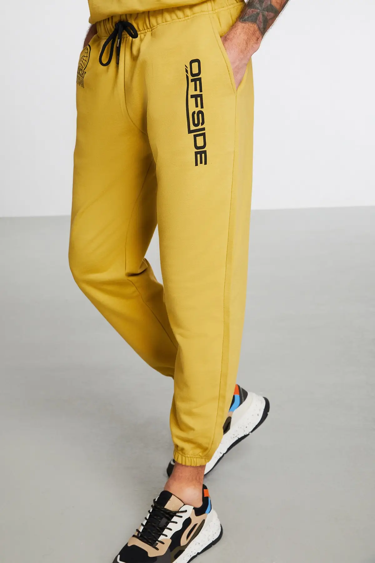 Men's Saffron Yellow Comfort Elastic Waist And Legs OFFSIDE Printed Sweatpants Cotton Stylish Quality
Men's Saffron Yellow Comfort Elastic Waist And Legs OFFSIDE Printed Sweatpants Cotton Stylish Quality