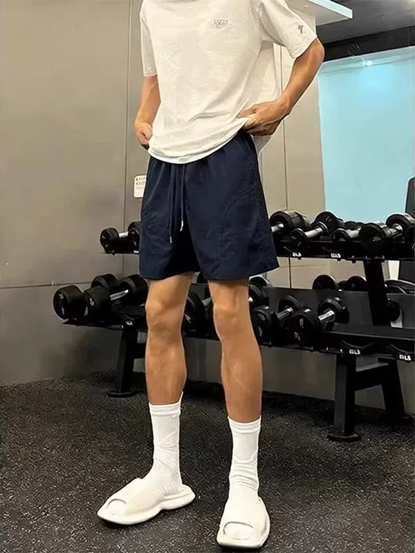 Quick Dry Sports Shorts Men's Summer American Slant Cut Fitness Pants Casual Outdoor Training Fourths Polyester Fiber Shorts
Quick Dry Sports Shorts Men's Summer American Slant Cut Fitness Pants Casual Outdoor Training Fourths Polyester Fiber Shorts