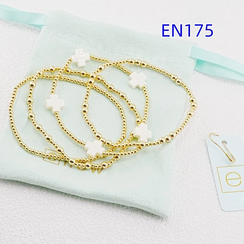YEEVAA 4Pcs Gold Beaded Stretch Bracelet Set, Stackable Ball Chain & White Cross Charm Bracelets for Women
YEEVAA 4Pcs Gold Beaded Stretch Bracelet Set, Stackable Ball Chain & White Cross Charm Bracelets for Women