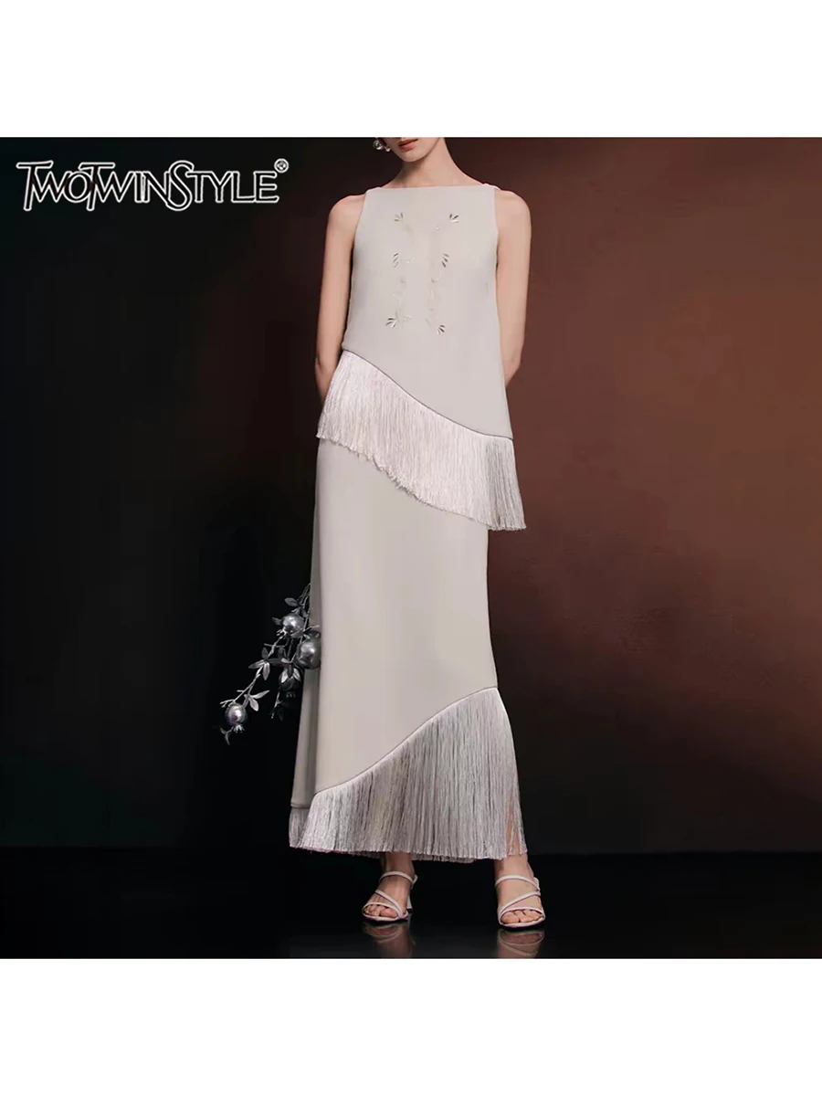 TWOTWINSTYLE Solid Spliced Tassel Loose Two Piece Set for Women Round Neck Sleeveless Top High Waist Skirt Sets Female Elegant
TWOTWINSTYLE Solid Spliced Tassel Loose Two Piece Set for Women Round Neck Sleeveless Top High Waist Skirt Sets Female Elegant