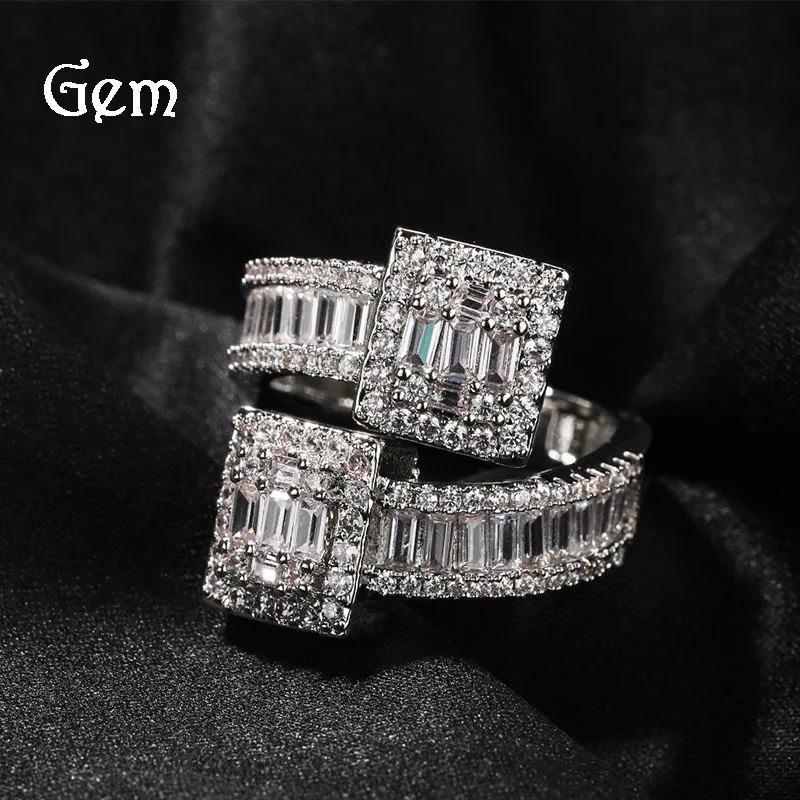 European and American light luxury fashion inlaid zircon staggered T-shaped opening design square diamond ring for men and women
European and American light luxury fashion inlaid zircon staggered T-shaped opening design square diamond ring for men and women