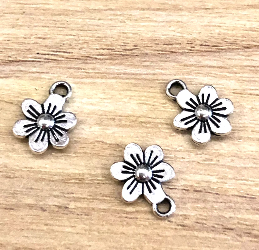 50pcs 9*12mm 2sided flower design pendants for jewelry making Zinc Alloy metal HW2924 
50pcs 9*12mm 2sided flower design pendants for jewelry making Zinc Alloy metal HW2924