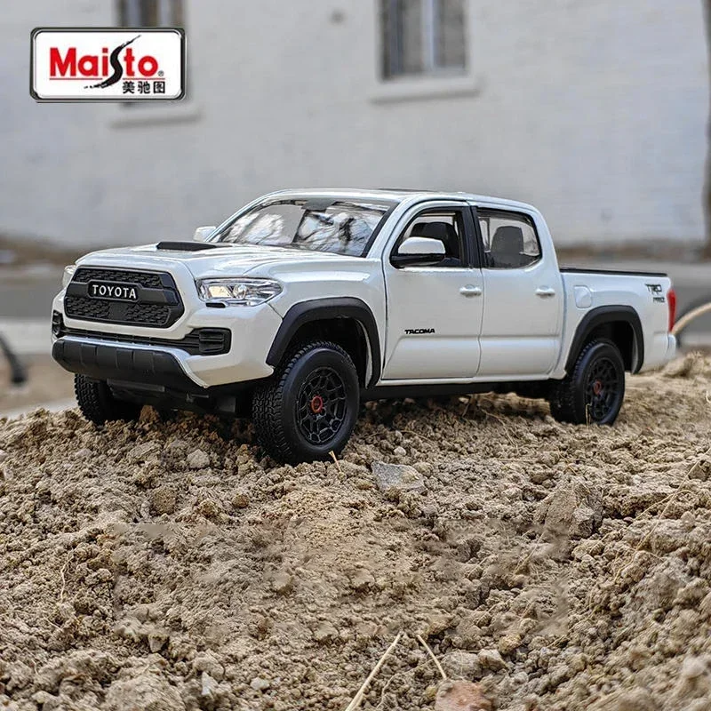 1:27 Toyota Tacoma TRD PRO 2023 Alloy Car Diecasts & Toy Vehicles Car Model Miniature Scale Model Car Toys
1:27 Toyota Tacoma TRD PRO 2023 Alloy Car Diecasts & Toy Vehicles Car Model Miniature Scale Model Car Toys