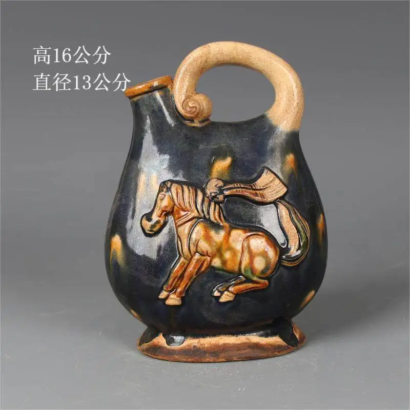 Traditional Chinese Tang Sancai antique teapot wine pot porcelain Exquisite horse reliefs classical folk decoration ornaments
Traditional Chinese Tang Sancai antique teapot wine pot porcelain Exquisite horse reliefs classical folk decoration ornaments