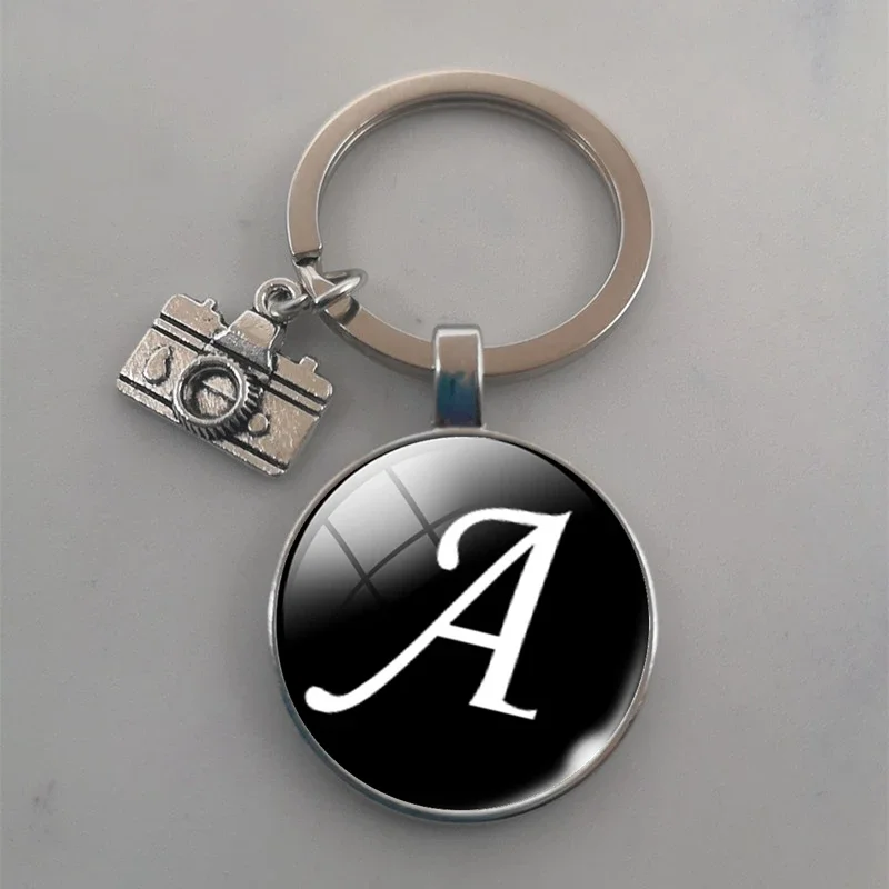 Popular SLR Lens Keychain Camera Pendant Keychain A-Z Letters DIY Jewelry Gifts Between Photographer SLR Enthusiast Friends
Popular SLR Lens Keychain Camera Pendant Keychain A-Z Letters DIY Jewelry Gifts Between Photographer SLR Enthusiast Friends