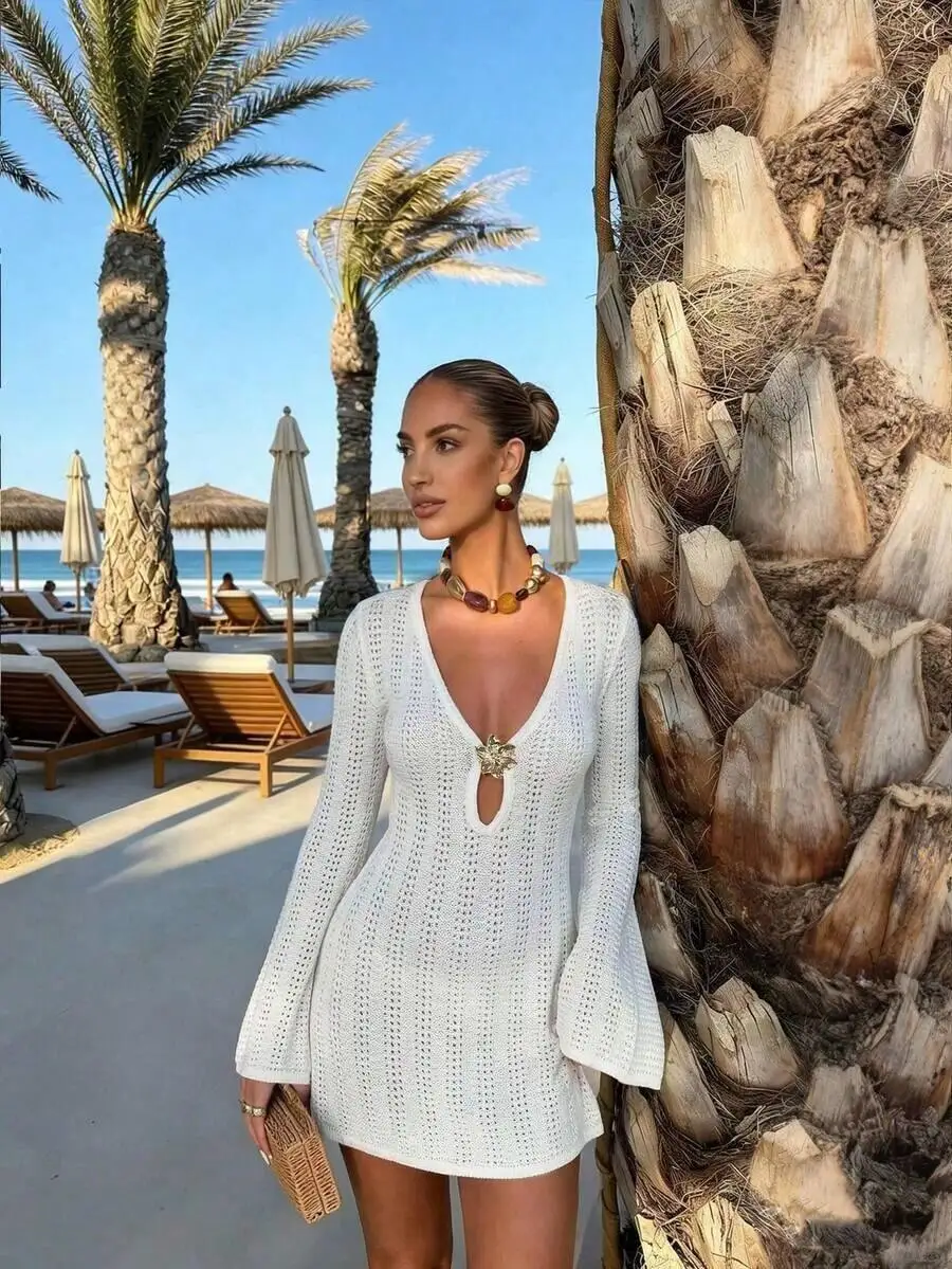 Womens White Knit Mini Dress With Deep V-Neck And Hollow Out Detail Beach Vacation Style
Womens White Knit Mini Dress With Deep V-Neck And Hollow Out Detail Beach Vacation Style