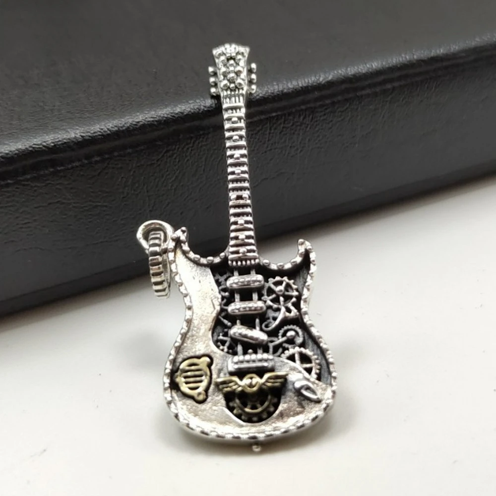 Real 925 Sterling Silver Punk Style Guitar Pendant For Men And Women Personalized Hip-hop Fashion Couple Jewelry
Real 925 Sterling Silver Punk Style Guitar Pendant For Men And Women Personalized Hip-hop Fashion Couple Jewelry