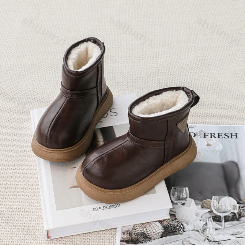 Fashion Children's Snow Boots 2025 Winter New Warm Non Slip Girls' Casual Shoes Thicken Plush Comfortable Boys' Flat Short Boots
Fashion Children's Snow Boots 2025 Winter New Warm Non Slip Girls' Casual Shoes Thicken Plush Comfortable Boys' Flat Short Boots