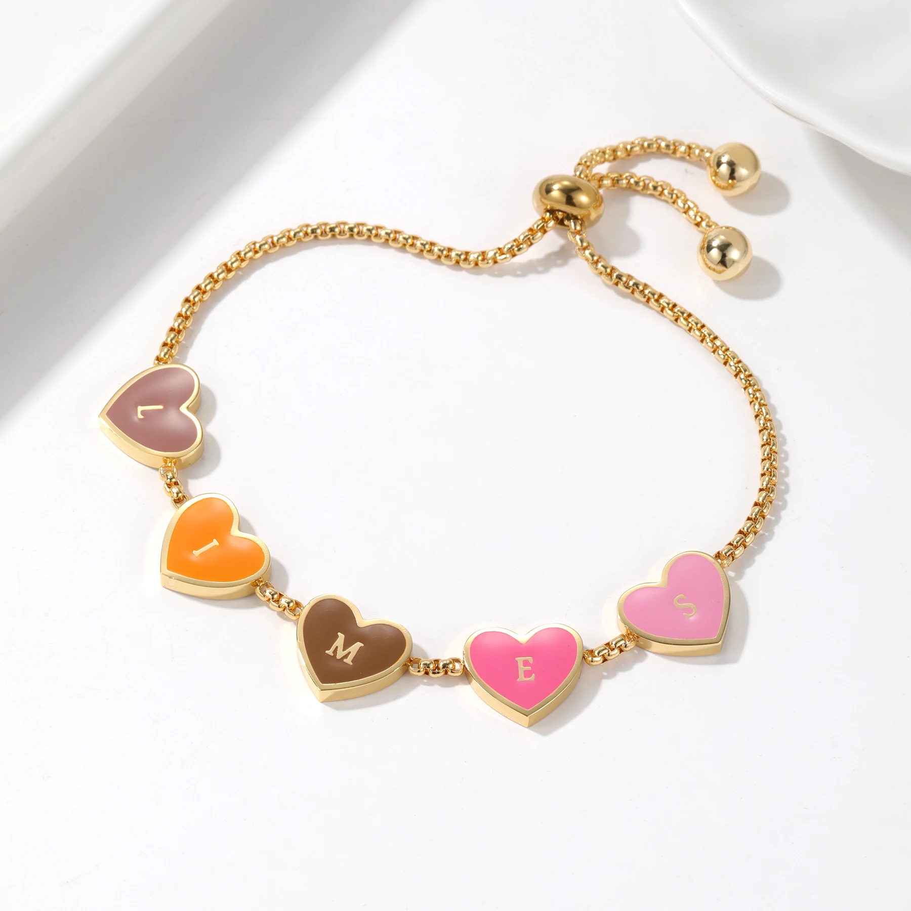 Цветной браслет с буквами на заказ, эмалированное сердце, подвеска, регулируемая цепочка из бисера, персонализированное имя, ювелирные изделия, Рождественский подарок для девочек-подростков
Цветной браслет с буквами на заказ, эмалированное сердце, подвеска, регулируемая цепочка из бисера, персонализированное имя, ювелирные изделия, Рождественский подарок для девочек-подростков