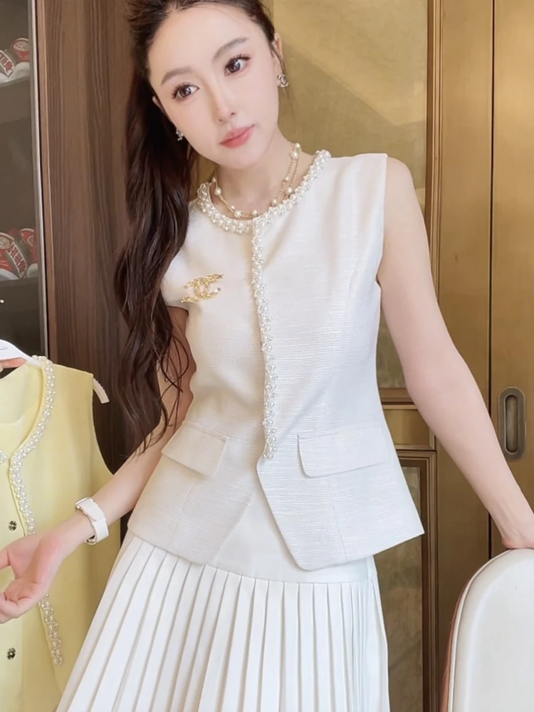 Жилет Tian Jiao Baby Pearl с жемчужной отделкой, без рукавов, с завышенной талией, оригинальный дизайн, летний, тонкий
Жилет Tian Jiao Baby Pearl с жемчужной отделкой, без рукавов, с завышенной талией, оригинальный дизайн, летний, тонкий