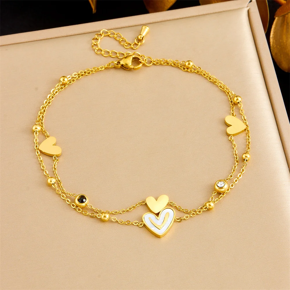 18K Gold Double Layer Heart Charm Bracelet with Shell & Crystal Accents 316L Stainless Steel Women Love Jewelry
18K Gold Double Layer Heart Charm Bracelet with Shell & Crystal Accents 316L Stainless Steel Women Love Jewelry