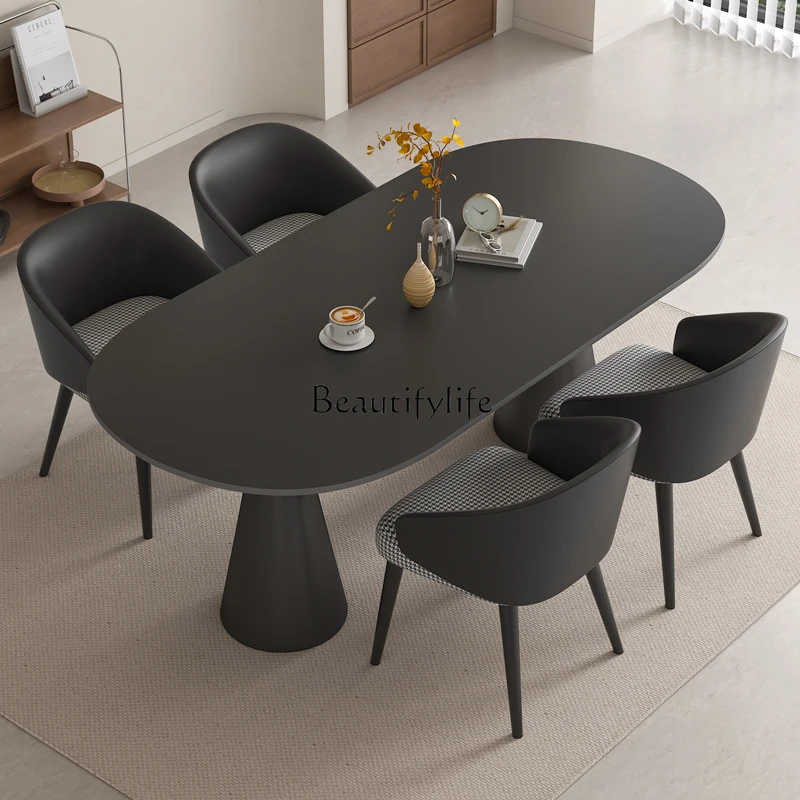 Pure black rock slab dining table oval household wabi sabi antique dining table designer
Pure black rock slab dining table oval household wabi sabi antique dining table designer