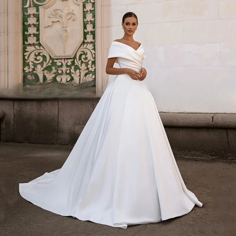 Vestido De Noiva Свадебные платья трапециевидной формы, атласное свадебное платье с открытыми плечами и V-образным вырезом по индивидуальному заказу
Vestido De Noiva Свадебные платья трапециевидной формы, атласное свадебное платье с открытыми плечами и V-образным вырезом по индивидуальному заказу