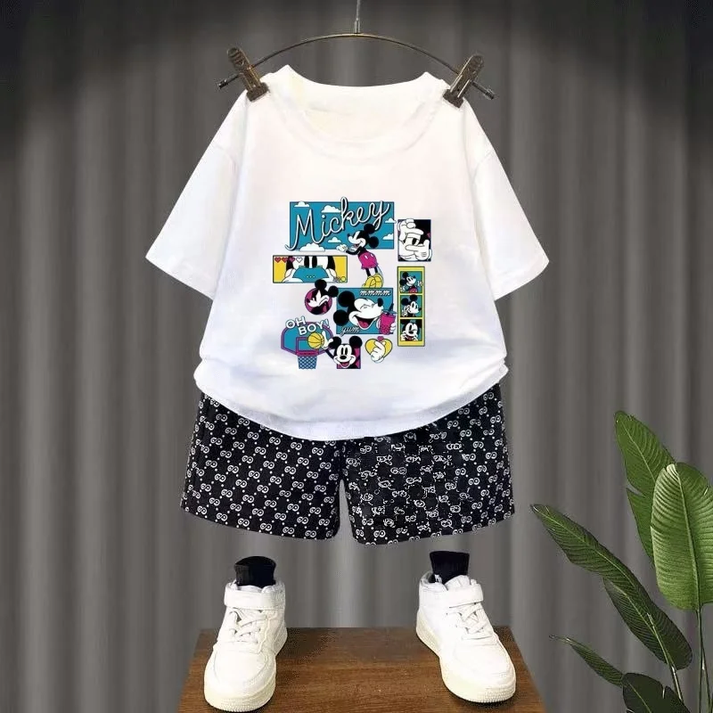 Летний комплект одежды для маленьких девочек и мальчиков, детская футболка с мультяшным принтом Микки и клетчатые шорты, костюм из 2 предметов, детский спортивный костюм с короткими рукавами
Летний комплект одежды для маленьких девочек и мальчиков, детская футболка с мультяшным принтом Микки и клетчатые шорты, костюм из 2 предметов, детский спортивный костюм с короткими рукавами
