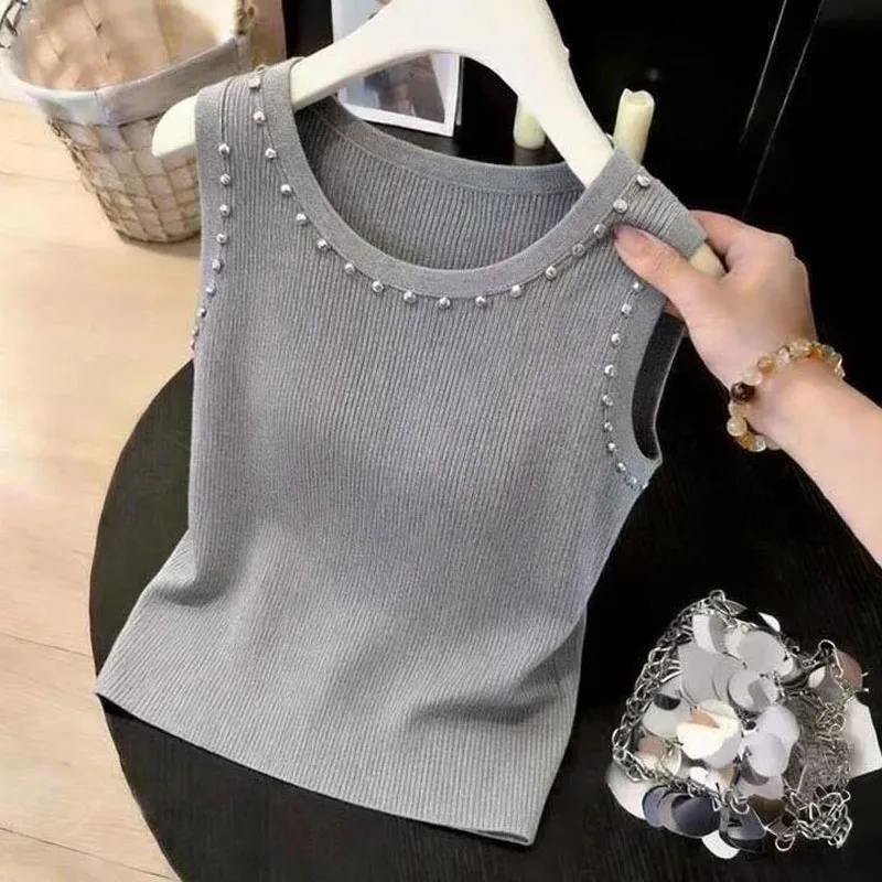 Outerwears Knitted Women Sweater Vest Fashion O-Neck Beading Knit Sweater Vest Women Tops Summer Sleeveless Women Clothing Q3773
Outerwears Knitted Women Sweater Vest Fashion O-Neck Beading Knit Sweater Vest Women Tops Summer Sleeveless Women Clothing Q3773
