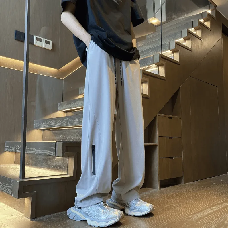 Мужские свободные брюки с широкими штанинами, повседневные брюки на шнурке с боковыми карманами на молнии, уличная одежда
Мужские свободные брюки с широкими штанинами, повседневные брюки на шнурке с боковыми карманами на молнии, уличная одежда