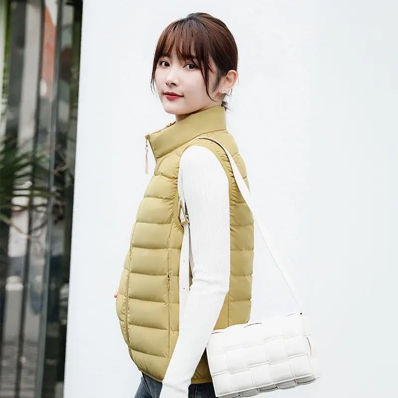 Autumn Winter Sleeveless Waistcoat Jacket Parkas Women Ultra Light Thin White Duck Down Vest Coat Lady Stand Collar Bigsize Tank
Autumn Winter Sleeveless Waistcoat Jacket Parkas Women Ultra Light Thin White Duck Down Vest Coat Lady Stand Collar Bigsize Tank