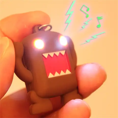 So Cool !!! Ultra Bright LED Cute Mini Domo Kun Action Figure Toys LED Flashlight Keychains With Sound Keychain Kids Gifts
