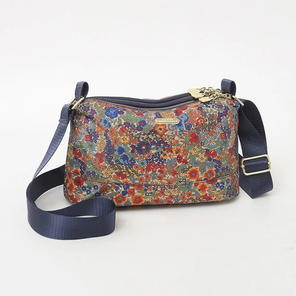 Fashion Nylon Women's Shoulder Bag Large Capacity Multi-layer Pocket Women's Sling Bag Floral Printed Crossbody Bag for Mom
Fashion Nylon Women's Shoulder Bag Large Capacity Multi-layer Pocket Women's Sling Bag Floral Printed Crossbody Bag for Mom