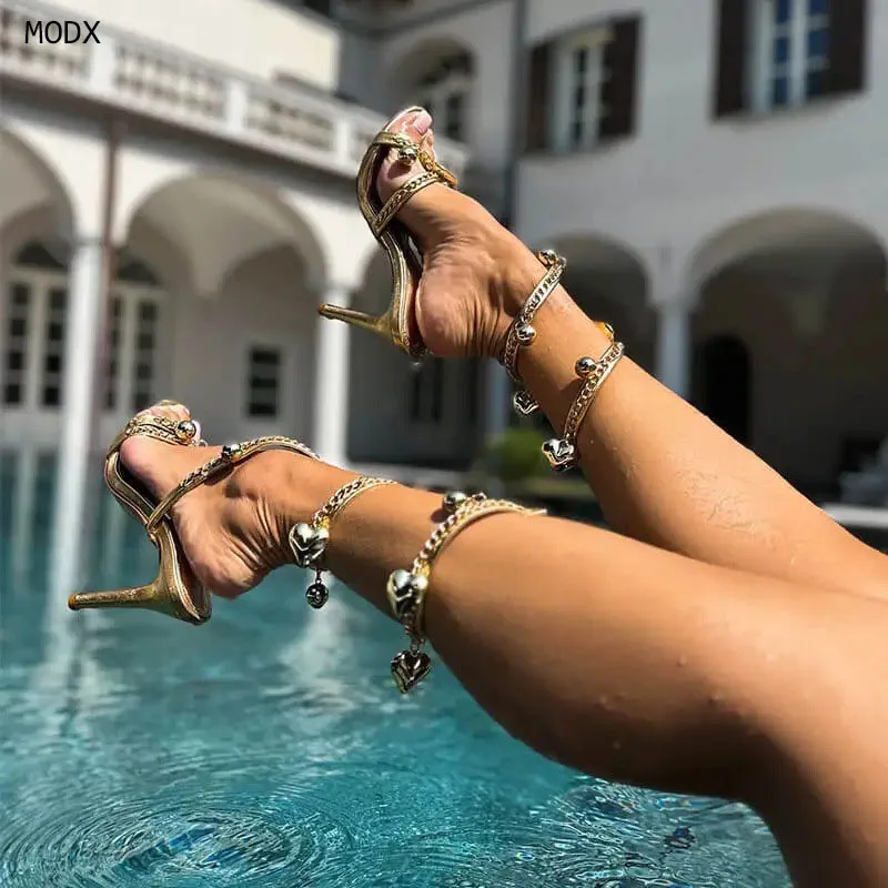 2026 Women Gold Metallic Open Toe Stiletto Heel Gladiator Sandals Heart & Ball Charm Chain Wrap High Heels 46
2026 Women Gold Metallic Open Toe Stiletto Heel Gladiator Sandals Heart & Ball Charm Chain Wrap High Heels 46