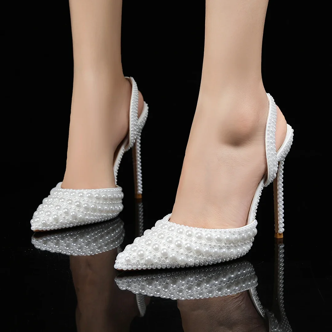 Новые модные женские свадебные сандалии высокого качества 8,5 см, женские сандалии с жемчугом и заклепками, роскошные женские сандалии на высоком каблуке с открытым носком и пряжкой
Новые модные женские свадебные сандалии высокого качества 8,5 см, женские сандалии с жемчугом и заклепками, роскошные женские сандалии на высоком каблуке с открытым носком и пряжкой