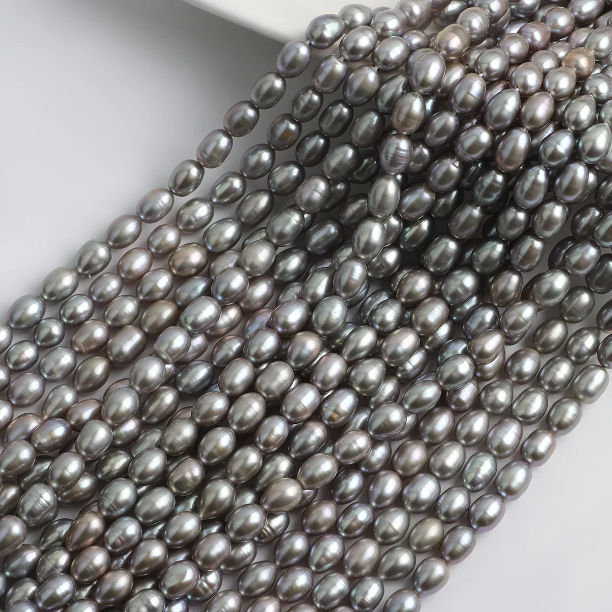 7-8 мм сильные легкие гальванические серые рисовые бусины из натурального пресноводного жемчуга, бусины «сделай сам», ювелирный материал, аксессуары
7-8 мм сильные легкие гальванические серые рисовые бусины из натурального пресноводного жемчуга, бусины «сделай сам», ювелирный материал, аксессуары