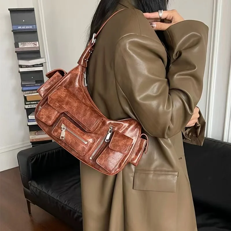 Retro Small Numerous Pocket Motorcycle Bag Armpit Bag Concave Shape Large Capacity Shoulder Bag Unisex High-end Crossbody Bag
Retro Small Numerous Pocket Motorcycle Bag Armpit Bag Concave Shape Large Capacity Shoulder Bag Unisex High-end Crossbody Bag