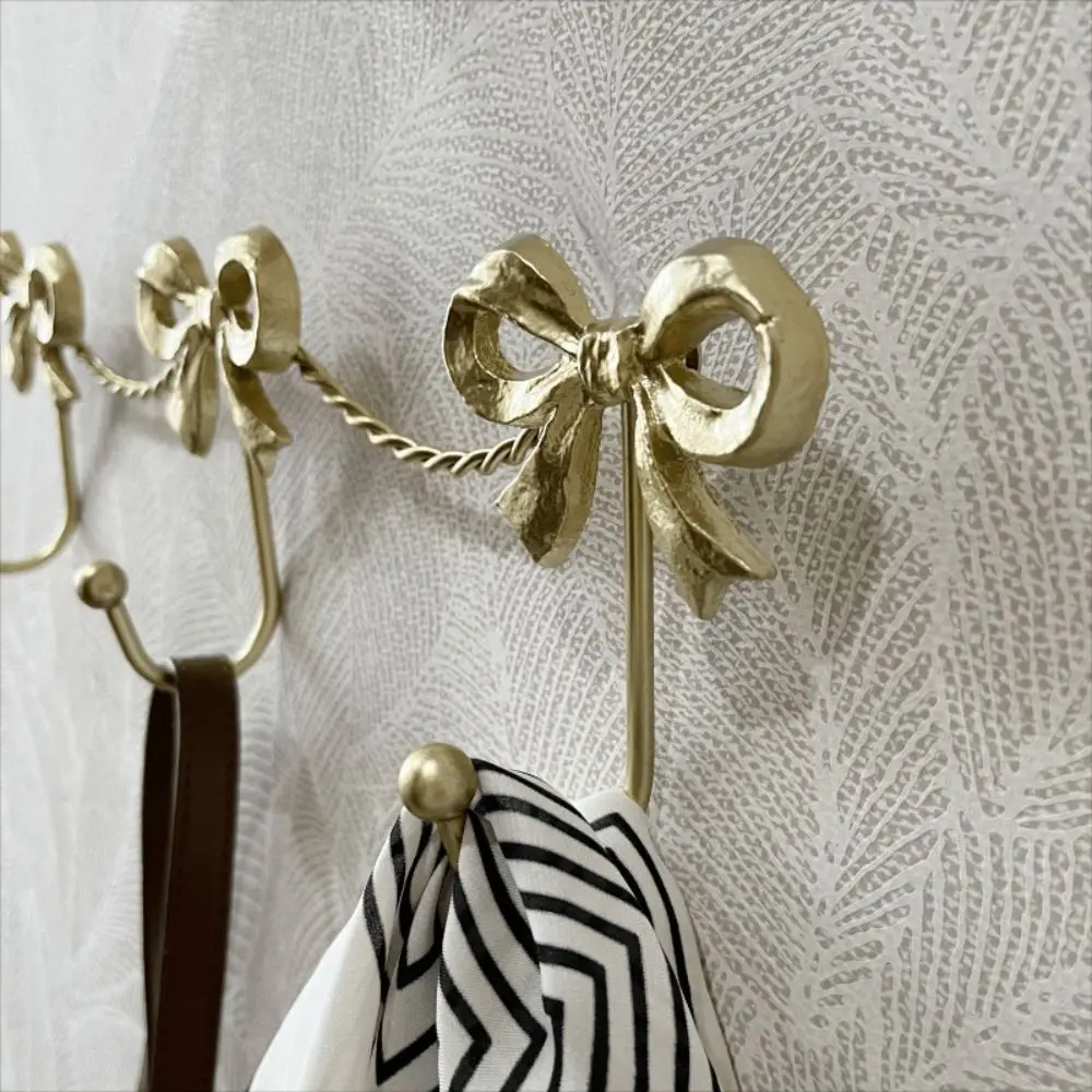 Golden Finish Metal Bow Wall Hooks Sturdy Metal Smooth Finish Decorative Hangers Iron Material Bow Design Wall Hook Living Room
Golden Finish Metal Bow Wall Hooks Sturdy Metal Smooth Finish Decorative Hangers Iron Material Bow Design Wall Hook Living Room